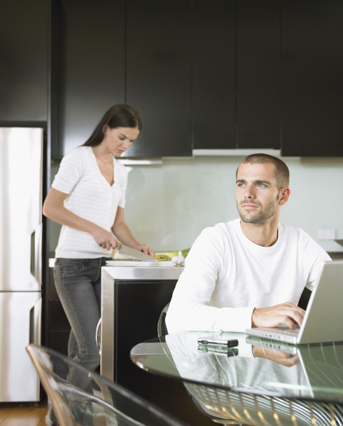 Man and woman in modern kitchen - Fotó, kép