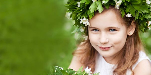 Beautiful  little girl in a white dress  in spring wood. Pretty  - Φωτογραφία, εικόνα