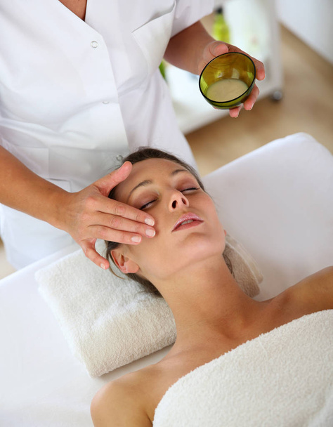 Woman receiving a face massage - Photo, Image
