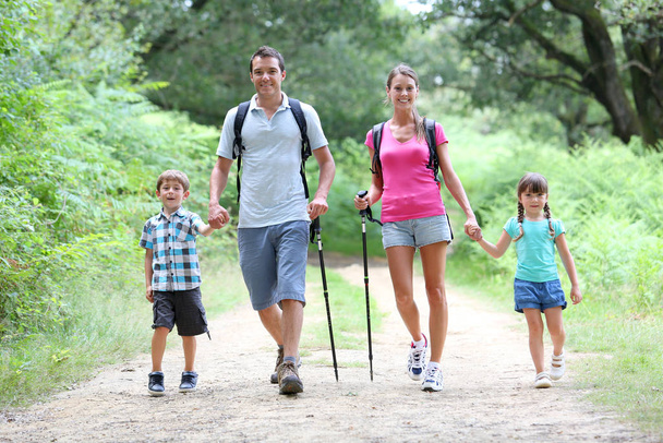 Family on a trekking day in countryside - Foto, Imagen