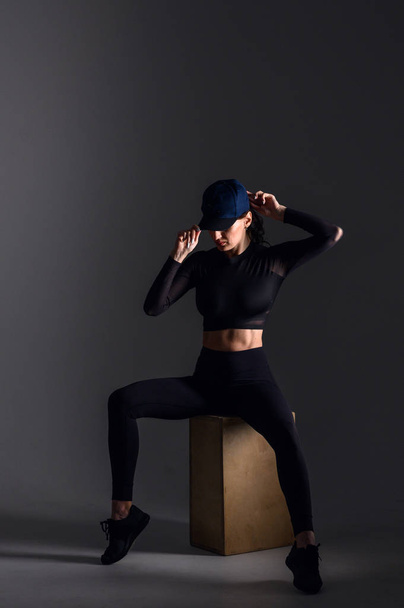 Sport concept. A strong athletic, women sprinter, wearing in the sportswear, fitness and sport motivation - 写真・画像