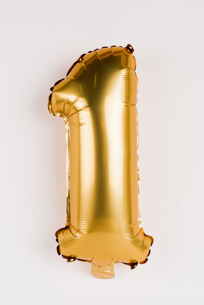 Festive golden balloon in shape of one number on grey background - Fotoğraf, Görsel