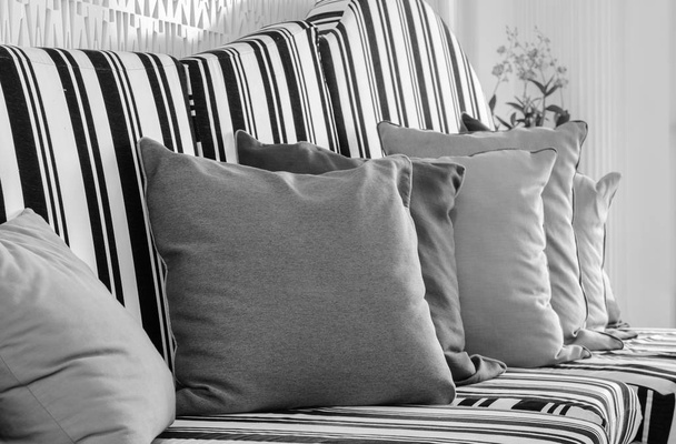 White and black sofa with pillows. Black and white color image. - Φωτογραφία, εικόνα