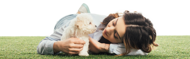 panoramic shot of woman looking at Havanese puppy isolated on white - Fotó, kép