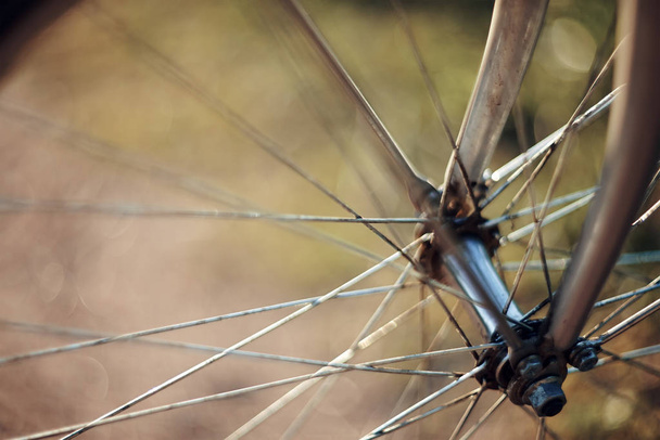 Abstract background with a forward wheel of the bicycle with bokeh - Φωτογραφία, εικόνα