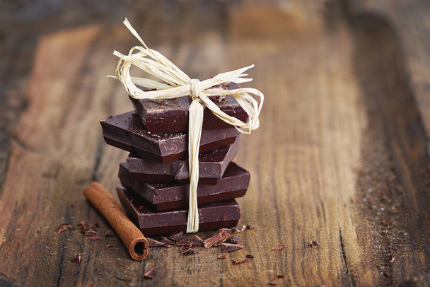 chocolate pieces which are tied together with phloem - Zdjęcie, obraz