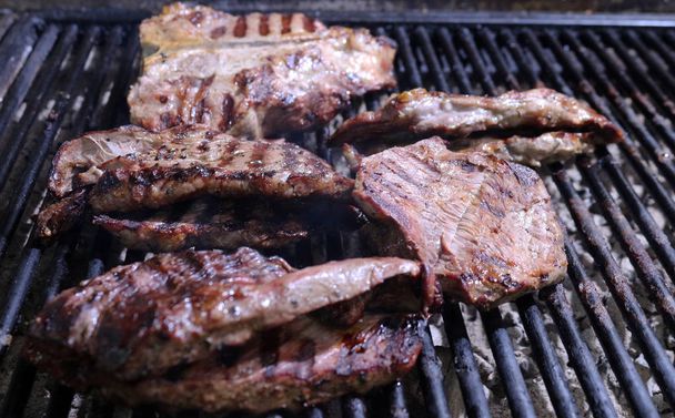 Grilled Beef Steaks on the Barbecue BBQ - Photo, Image