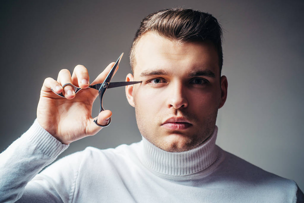 Barbershop service concept. Professional barber equipment. Cut hair. Man strict face hold scissors. Barber glossy hairstyle hold steel scissors. - Foto, Imagem