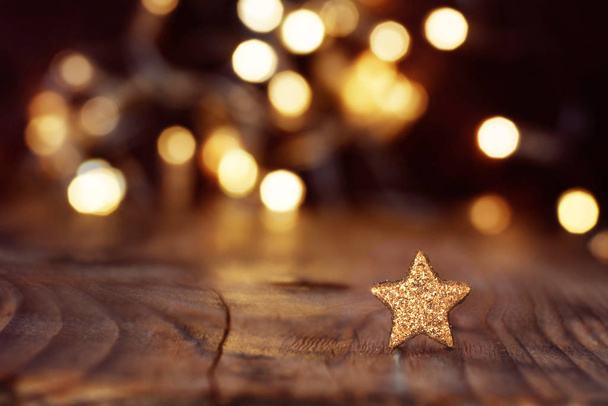 festive shining christmas background with stars and bokeh - Valokuva, kuva