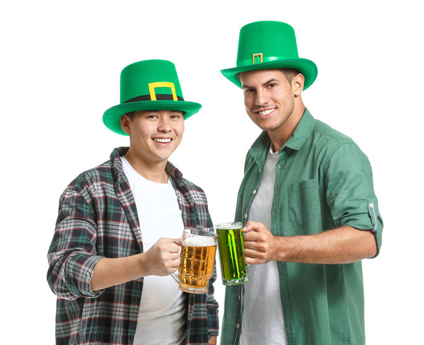 Young men with beer on white background. St. Patrick's Day celebration - Photo, Image