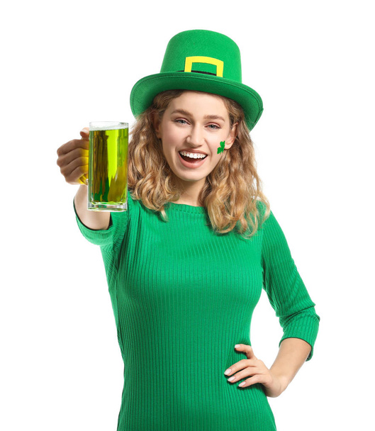 Young woman with beer on white background. St. Patrick's Day celebration - Photo, Image