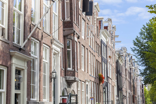 typical facades in amsterdam,the netherlands - Zdjęcie, obraz