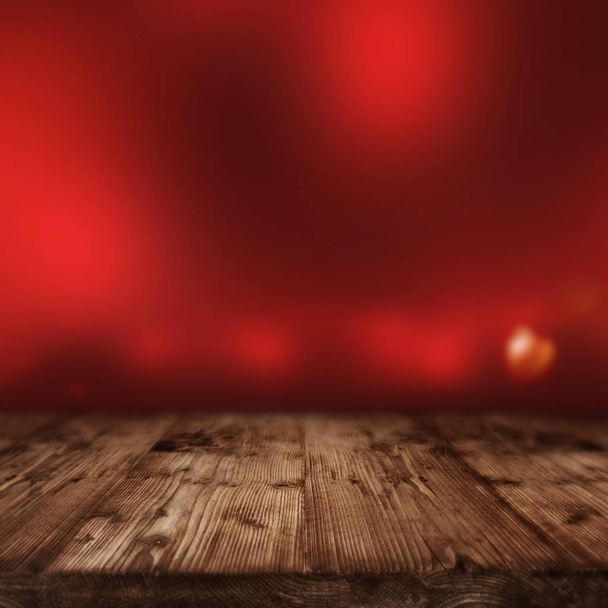 valentines day background with red lights in front of a empty wooden table for a concept - Φωτογραφία, εικόνα