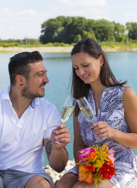happy young couple with champagne glasses,engagement,bavaria,germany - Φωτογραφία, εικόνα