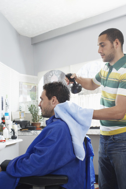 Barber preparing man - Photo, Image