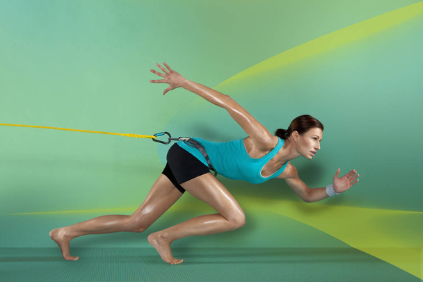 Athlete training with rope - Photo, Image