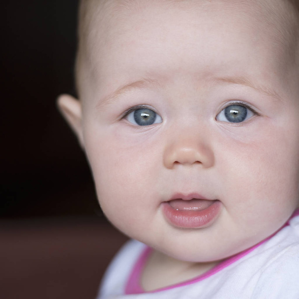 Close up portrait of baby girl age 11 months - 写真・画像