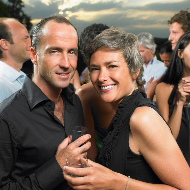 Couple at a cocktail party - Photo, Image