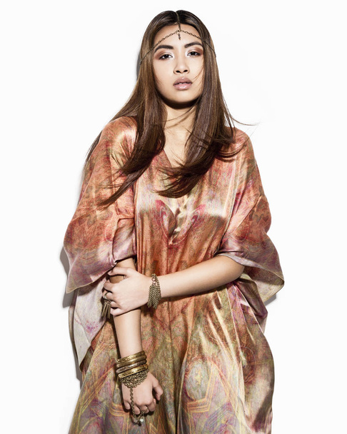 Portrait of young woman wearing kaftan dress - Photo, image