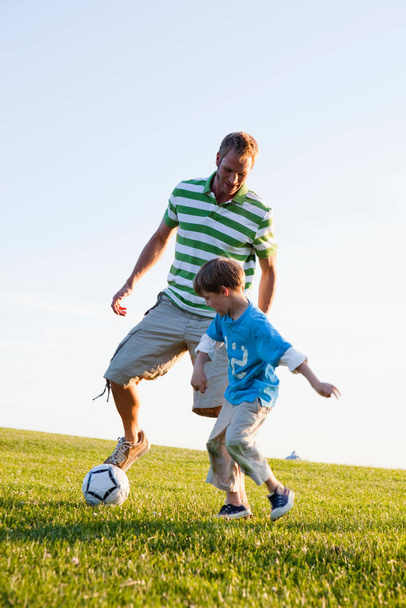 Father and Son Playing Soccer - Photo, Image