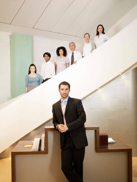 Portrait of office workers on stairs - Zdjęcie, obraz