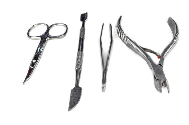 Um conjunto de ferramentas cosméticas para manicure e pedicure closeup.NEF
 - Foto, Imagem