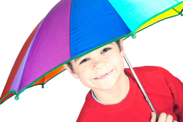 Child with umbrella in hand - Foto, afbeelding