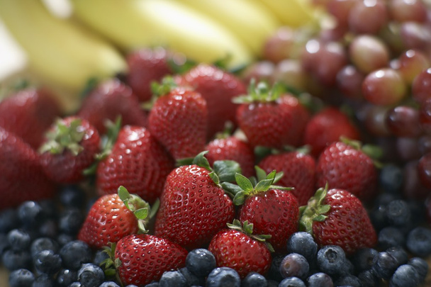 Blackberries, strawberries, grapes and bananas - Fotografie, Obrázek