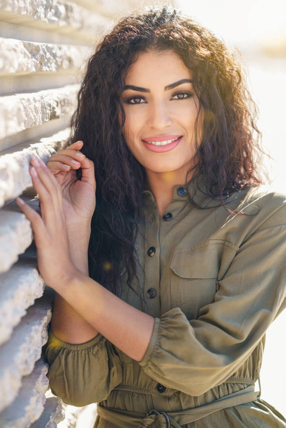 Young Arab Woman with curly hair outdoors - Photo, Image