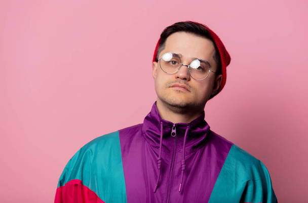 Style guy in glasses on pink background - Фото, зображення
