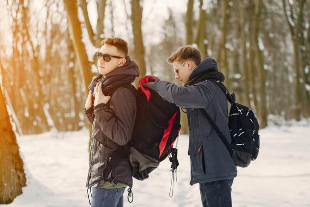 guys with backpack - 写真・画像