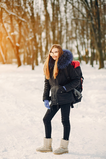 girl with backpack - Фото, изображение