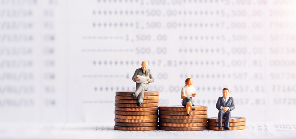 Miniature people: Elderly people sitting on coins stack. Retirement planning. money saving and Investment. Time counting down for retirement and pension. - Photo, Image
