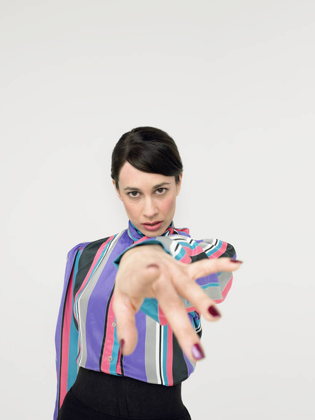Full length of fashionable female model pointing at you - Valokuva, kuva