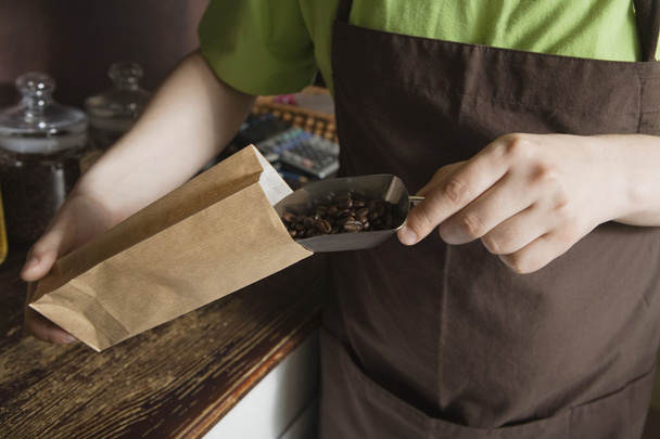 Salesperson Scooping Coffee Beans - Photo, Image
