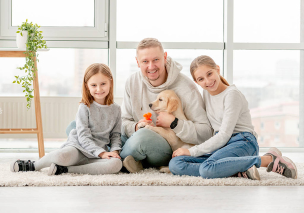 Happy family and puppy - Fotoğraf, Görsel