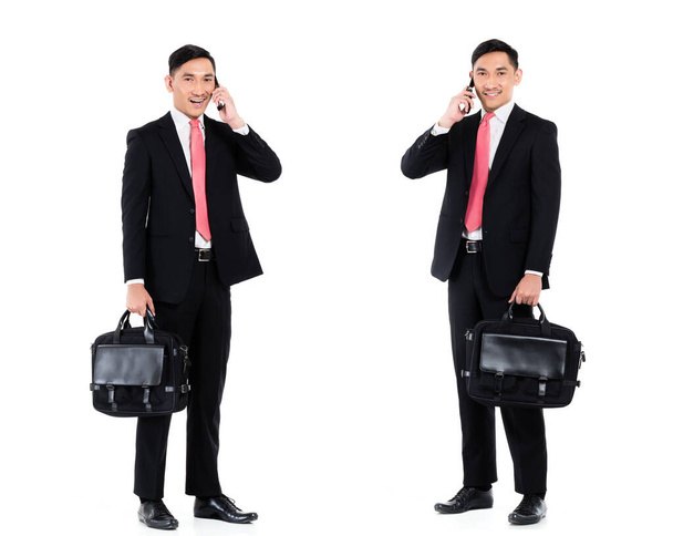 Asian business man, compositing of two scenes, isolated on white background - Zdjęcie, obraz