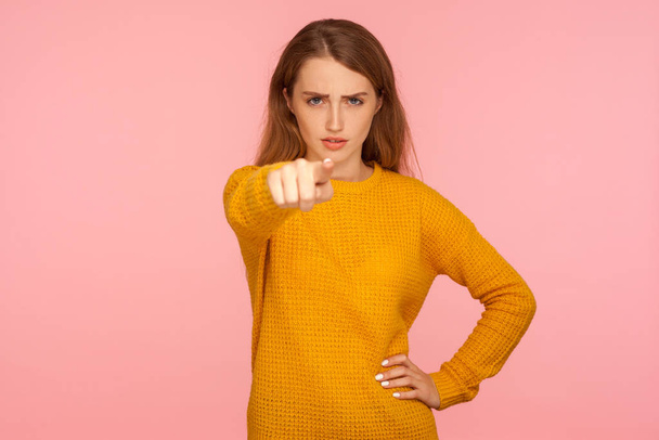 Hey you! Portrait of serious bossy ginger girl in sweater pointi - Photo, image