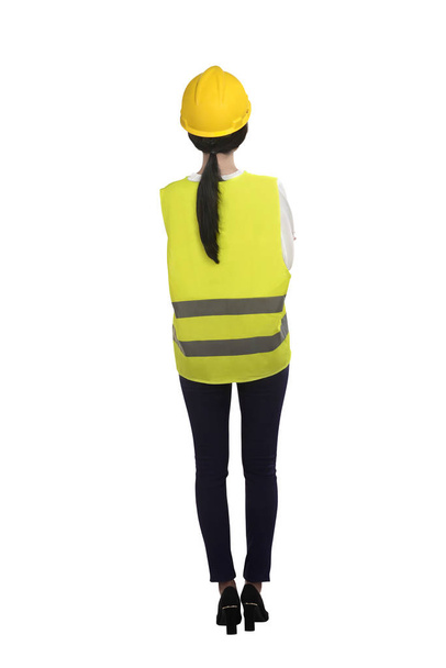 Back view of asian woman with worker uniform isolated over white background - Foto, Imagem