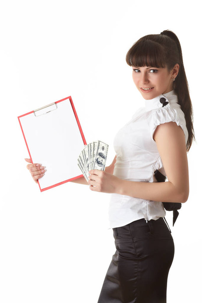 Businesswoman with money and clipboard on a white background. - Φωτογραφία, εικόνα