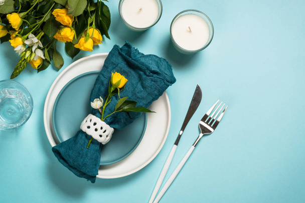 Spring table setting with flower top view. - Photo, Image