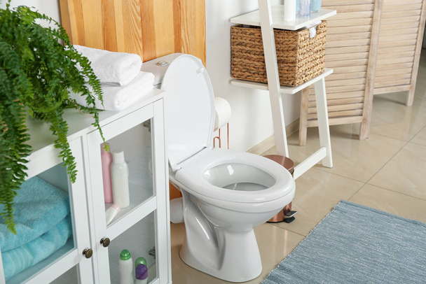 Stylish toilet bowl in modern bathroom interior - Foto, immagini