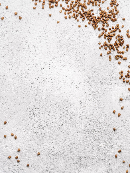 Flax seeds with copy space. Brown flax seed on gray concrete textured background. Top view or flat lay. Copy space. Healthy food and diet concept - Photo, Image