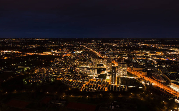 Aerial panoramic cityscape view with bright lights in night Munich - Foto, Bild