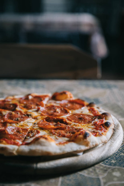 Pepperoni pizza on wood plate italian food - Photo, Image