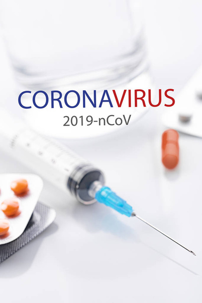 Coronavirus 2019-nCoV. Novel coronavirus, Middle East Respiratory Syndrome. Pills with CORONAVIRUS text. Chinese coronavirus outbreak. Virus Pandemic Protection Concept - Fotoğraf, Görsel
