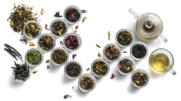 Gran variedad de té sobre un fondo blanco. La vista desde arriba
 - Foto, imagen