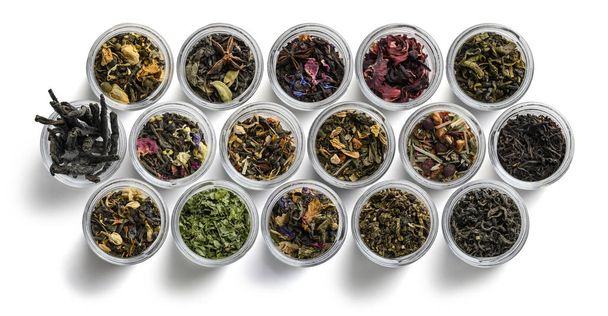 Large assortment of tea on a white background. The view from the top - Photo, Image