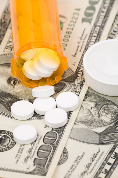 Medicine pills and dollar - Photo, Image