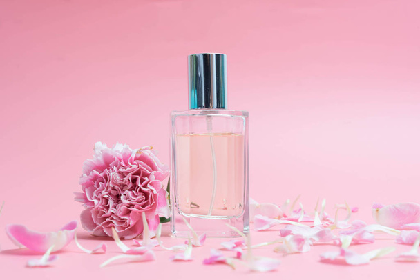 Perfume bottles on pink background - Photo, Image